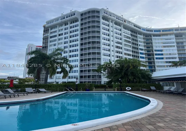 Photo 1 of Condo for sale at 100 Golden Isles Dr #706, Hallandale Beach, FL 33009 | MLS# A11848285 | Listing updated on 2026-10-01