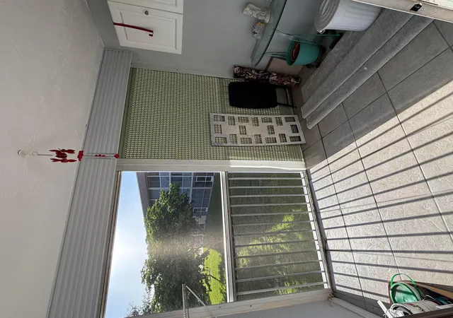 2nd image of 200 Vlg Grn Cir E, Palm Springs, FL 33461