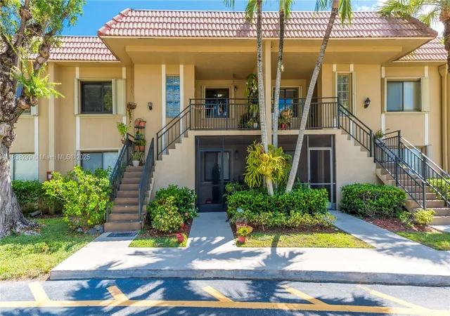 Listing Photo 1 - Condo for sale in building located at 302 Lakeview Dr, Royal Palm Beach, FL 33326 - Unit #202