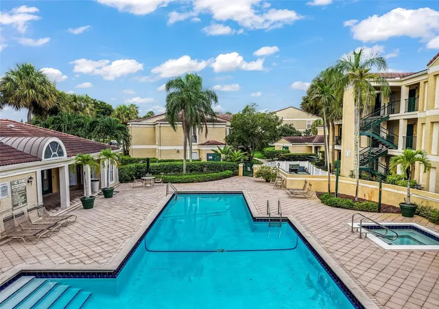 2nd image of 875 Riverside Dr, Coral Springs, FL 33071