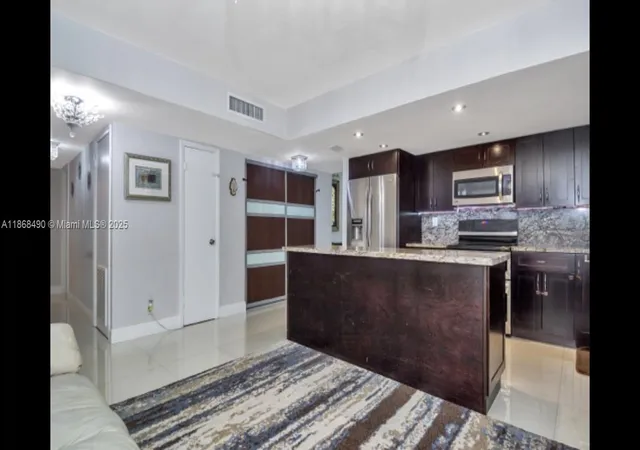 Condo for sale at 20401 NE 30th Avenue #108-8, Miami, FL 33180 | MLS# A11868490 | Listing updated on 2025-11-03