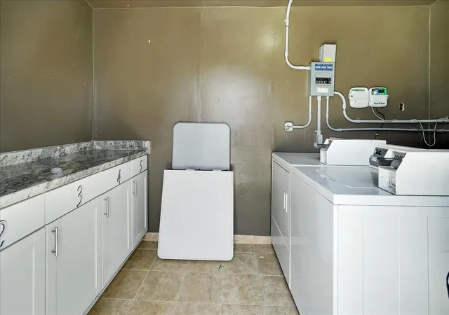 53rd image of 305 Cypress Dr E #1,2,3,4,5, Lake Park, FL 33403 | MLS# R11126199