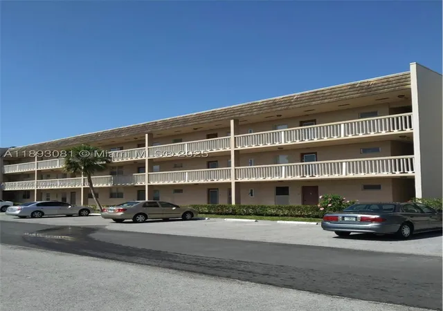 Listing Photo 1 - Condo for sale in building located at 6150 Nw 62Nd St, Tamarac, FL 33319 - Unit #308
