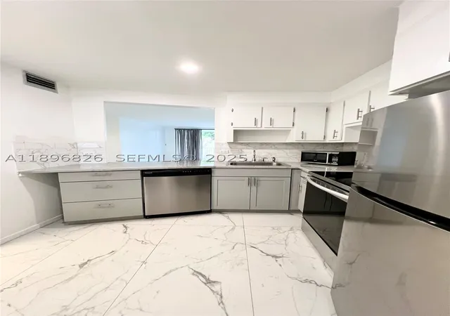 2nd image of 1710 Ne 191st St #307-3, Miami, FL 33179 | MLS# A11896826