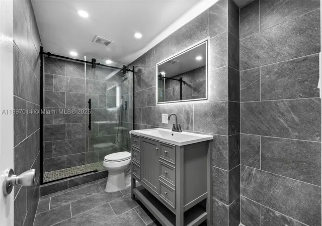 Photo 4 of Condo for sale at 401 Golden Isles Dr #304, Hallandale Beach, FL 33009 | MLS# A11897014 | Listing updated on 2026-10-08