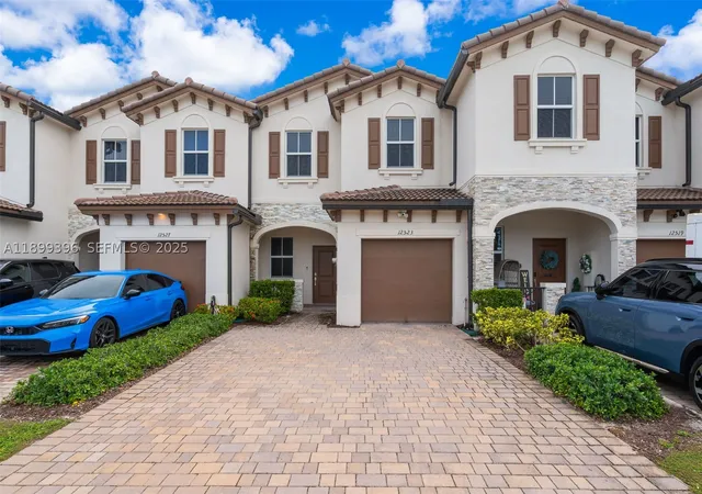 Photo 1 of Townhouse for sale at 12523 Nw 24Th Ave, Miami, FL 33167 | MLS# A11899396 | Listing updated on 2026-10-08