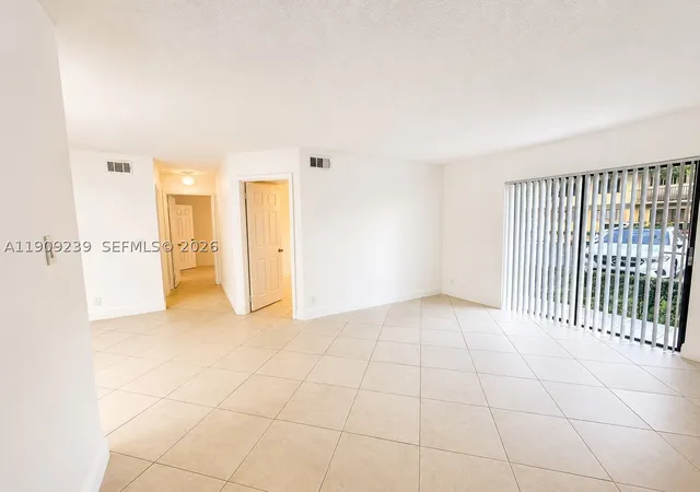 Photo 1 of Condo for sale at 523 Trace Cir #105, Deerfield Beach, FL 33441 | MLS# A11909239 | Listing updated on 2026-09-29