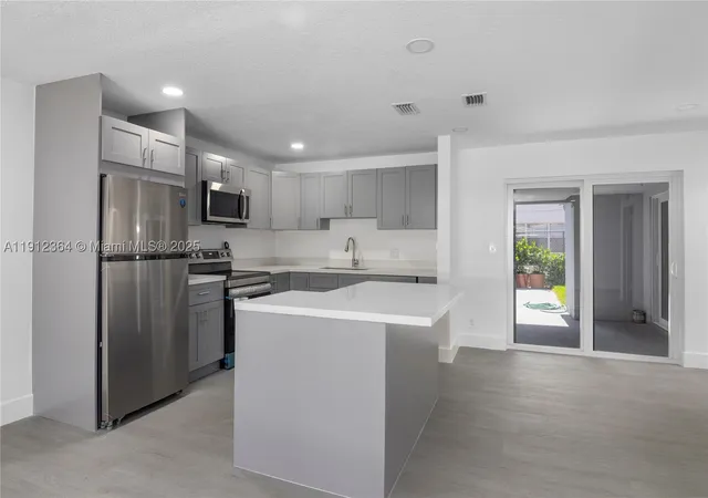 Photo 1 of Multi family home for sale at 1750 Ne 52nd St, Oakland Park, FL 33334 | MLS# A11912364 | Listing updated on 2026-08-13