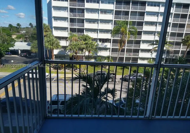 Photo 1 of Condo for sale at 700 Nw 214th St #403, Miami Gardens, FL 33169 | MLS# A11902381 | Listing updated on 2026-08-26