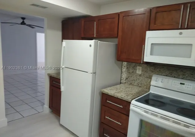 Photo 3 of Condo for sale at 700 Nw 214th St #403, Miami Gardens, FL 33169 | MLS# A11902381 | Listing updated on 2026-08-26