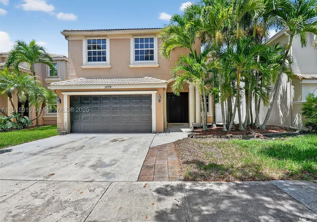 Photo 1 of Single family home for sale at 1579 Briar Oak Dr, Royal Palm Beach, FL 33411 | MLS# A11915910 | Listing updated on 2026-10-08
