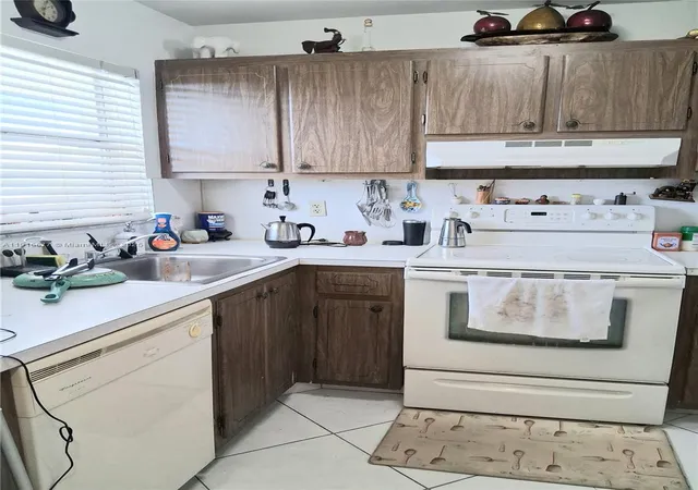 Listing Photo 1 - Condo for sale in building located at 8590 Sunrise Lakes Blvd, Sunrise, FL 33322 - Unit #310