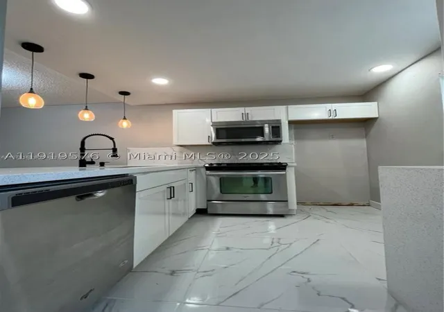 Photo 4 of Condo for sale at 5102 Nw 36Th St #605, Lauderdale Lakes, FL 33319 | MLS# A11919576 | Listing updated on 2026-06-17