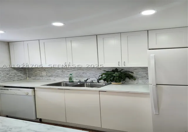 Photo 1 of Condo for sale at 1100 Ne 9Th Ave #203, Fort Lauderdale, FL 33304 | MLS# A11924706 | Listing updated on 2026-08-24