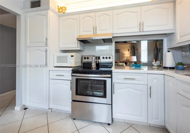 Photo 1 of Condo for sale at 4940 E Sabal Palm Blvd #414, Tamarac, FL 33319 | MLS# A11930244 | Listing updated on 2026-09-28