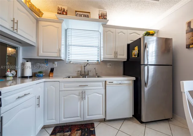 Photo 2 of Condo for sale at 4940 E Sabal Palm Blvd #414, Tamarac, FL 33319 | MLS# A11930244 | Listing updated on 2026-09-28