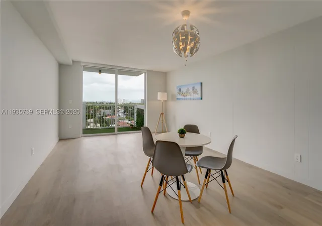 Listing Photo 1 - Condo for sale in building located at 2000 Ne 135Th St, South Miami, FL 33181 - Unit #908