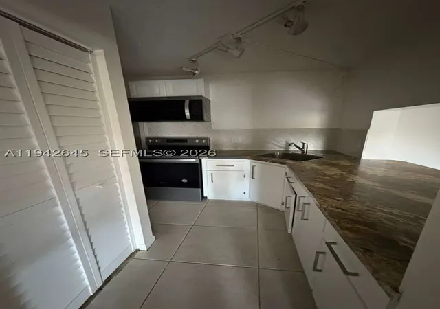 5th image of 623 Sea Pine Way #C1, Green Acres, FL 33415 | MLS# A11942645