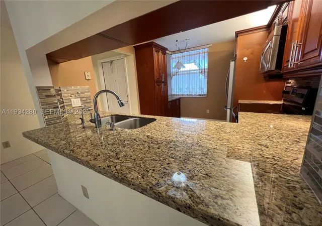 Photo 3 of Condo for sale at 10369 Nw 24Th Pl #201, Sunrise, FL 33322 | MLS# A11934280 | Listing updated on 2026-05-08