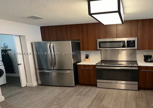 Photo 3 of Condo for sale at 14501 Grove Resort Ave #2129, Winter Garden, FL 34787 | MLS# A11950039 | Listing updated on 2026-01-23