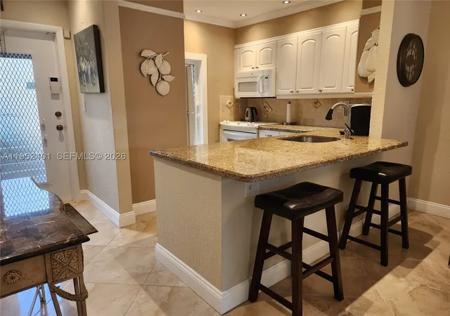Photo 2 of Condo for sale at 5100 Nw 35Th St #101, Lauderdale Lakes, FL 33319 | MLS# A11952401 | Listing updated on 2026-10-01