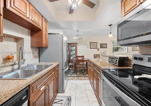Single family home for sale at 4714 Nw 50Th Ct, Tamarac, FL 33319 | MLS# A11951073