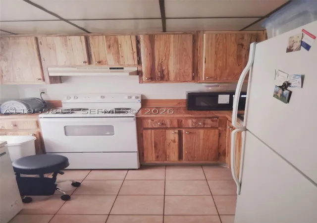 Photo 1 of Condo for sale at 3121 Nw 47Th Ter #411, Lauderdale Lakes, FL 33319 | MLS# A11955813 | Listing updated on 2026-08-26