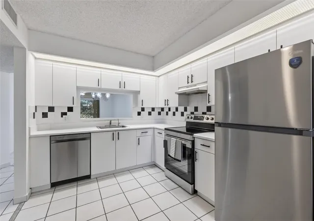 2nd image of 900 Sw 142nd Ave #213l, Pembroke Pines, FL 33027 | MLS# F10546170