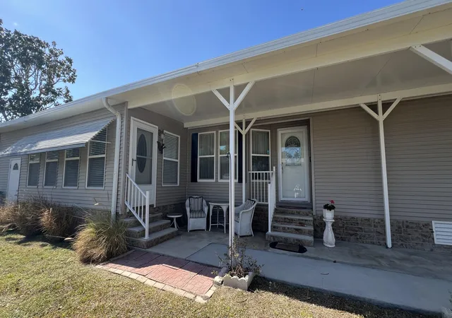 2nd image of 621 Puffin Dr, Barefoot Bay, FL 32976 | MLS# R11162578