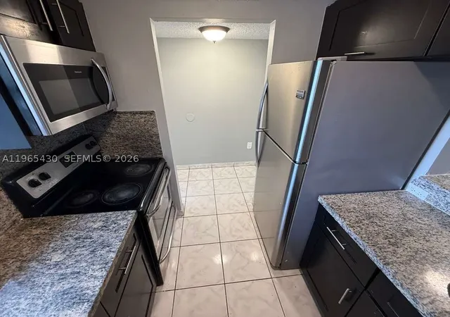 Photo 2 of Condo for sale at 2721 Nw 23rd Ct #4, Miami, FL 33142 | MLS# A11965430 | Listing updated on 2026-08-18