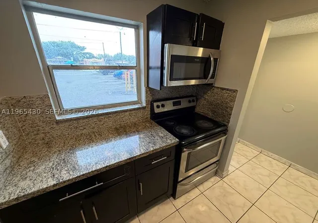 Photo 3 of Condo for sale at 2721 Nw 23rd Ct #4, Miami, FL 33142 | MLS# A11965430 | Listing updated on 2026-08-18