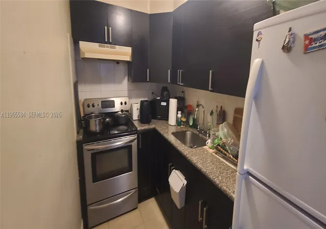Photo 2 of Condo for sale at 4801 Nw 7 St #209-16, Miami, FL 33126 | MLS# A11965584 | Listing updated on 2026-02-14