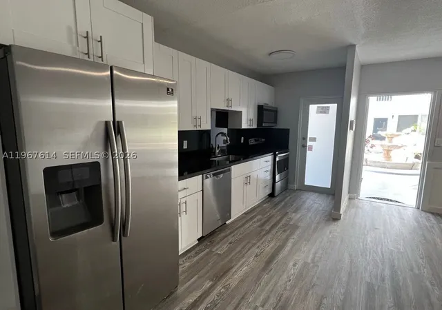Listing Photo 4 - Condo for sale in building located at 2430 Ne 135Th St, Miami, FL 33181 - Unit #105