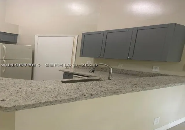 Photo 3 of Condo for sale at 9999 Summerbreeze Dr #1105, Sunrise, FL 33322 | MLS# A11967364 | Listing updated on 2026-07-27