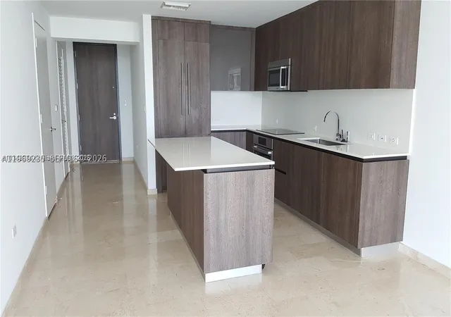 Photo 3 of Condo for sale at 68 Se 6Th St #3305, Miami, FL 33131 | MLS# A11969235 | Listing updated on 2026-02-21