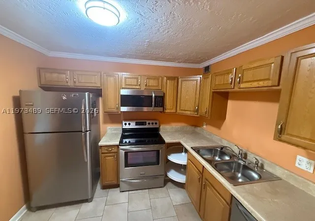Photo 2 of Condo for sale at 2801 Somerset Dr #105, Lauderdale Lakes, FL 33311 | MLS# A11973489 | Listing updated on 2026-08-24