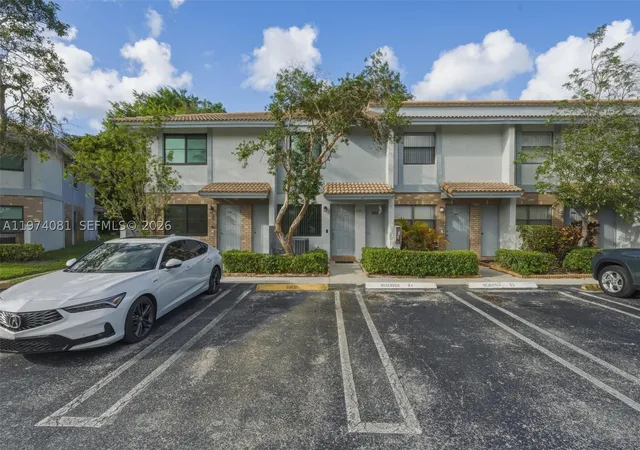 Photo 1 of Townhouse for sale at 9853 Riverside Dr #8-24, Coral Springs, FL 33071 | MLS# A11974081 | Listing updated on 2026-10-08