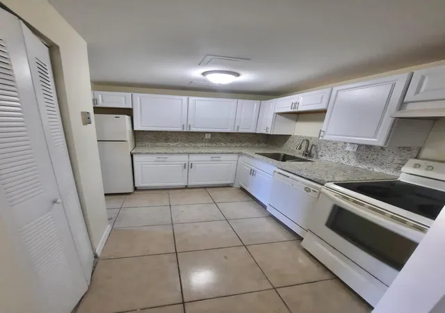 1st image of 409 Executive Center Dr #208, West Palm Beach, FL 33401 | MLS# B26000432