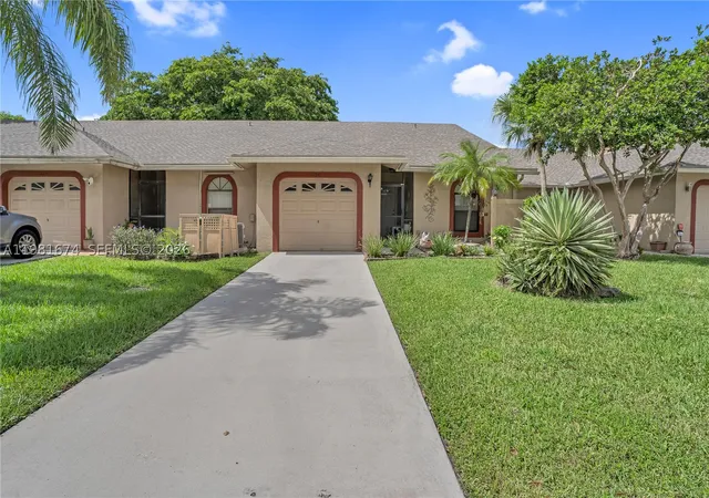 Photo 2 of Single family home for sale at 7641 Nw 99Th Ave, Tamarac, FL 33321 | MLS# A11981674 | Listing updated on 2026-10-08