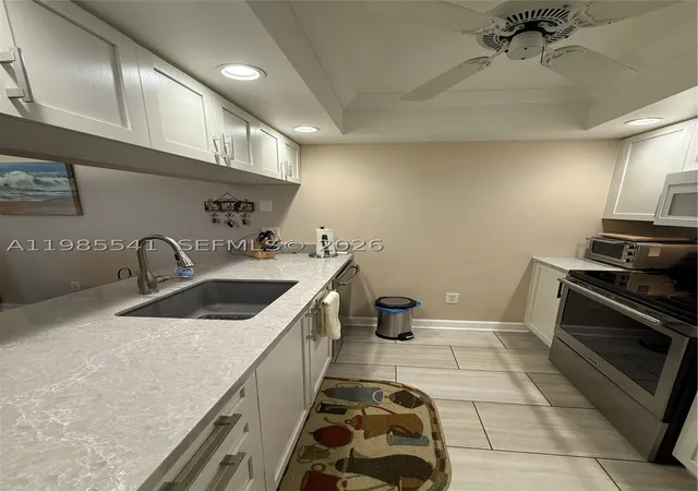 Listing Photo 4 - Condo for sale in building located at 608 Waterside Dr, Hypoluxo, FL 33462 - Unit #608
