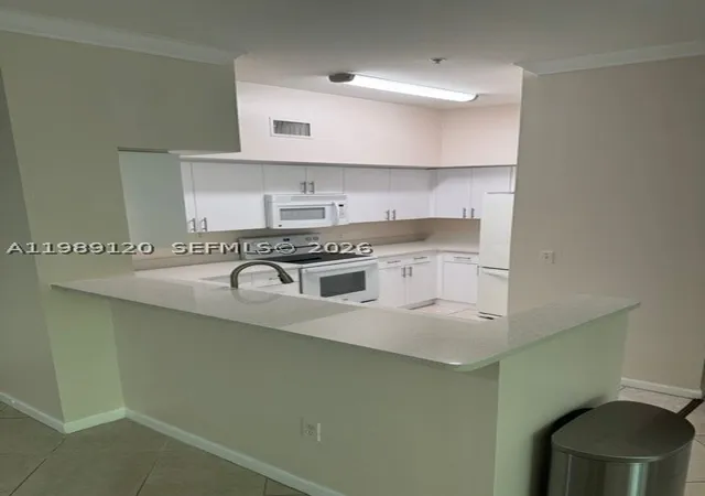 Listing Photo 2 - Condo for sale in building located at 11760 Saint Andrews Pl, Wellington, FL 33414 - Unit #302