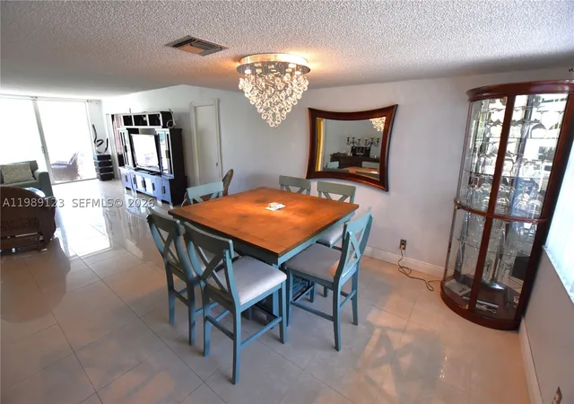 Photo 2 of Condo for sale at 3800 Oaks Clubhouse Dr #309, Pompano Beach, FL 33069 | MLS# A11989123 | Listing updated on 2026-03-25