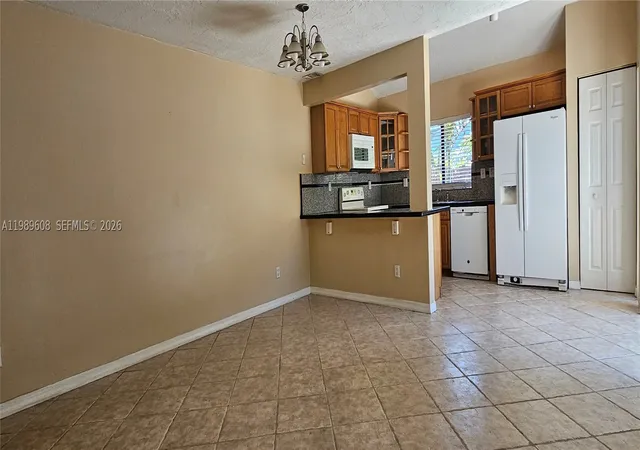 Photo 3 of Townhouse for sale at 610 Commodore Dr, Plantation, FL 33325 | MLS# A11989608 | Listing updated on 2026-09-16