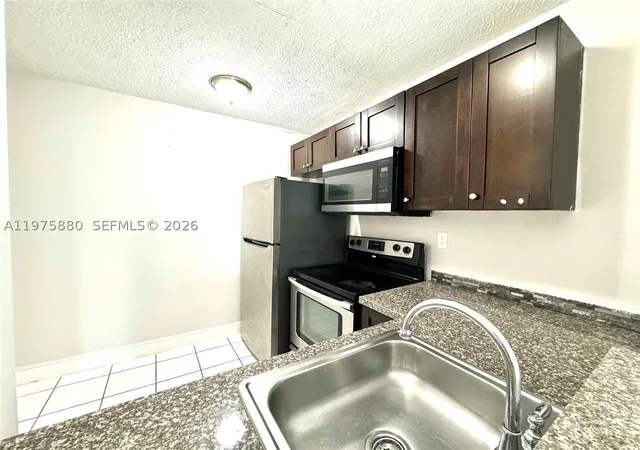 Photo 3 of Condo for sale at 484 Nw 165th St Rd #A-411, Miami, FL 33169 | MLS# A11975880 | Listing updated on 2026-08-26