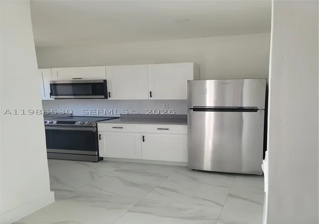 4th image of 1975 Nw 24Th Ct, Miami, FL 33125 | MLS# A11986530