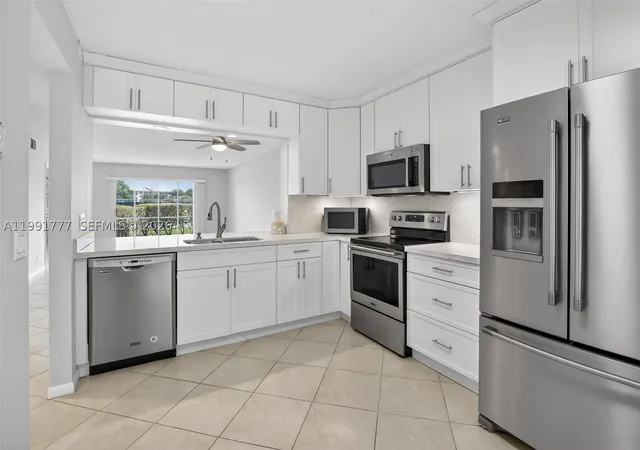 Photo 2 of Condo for sale at 901 Sw 128th Ter #102A, Pembroke Pines, FL 33027 | MLS# A11991777 | Listing updated on 2026-10-08