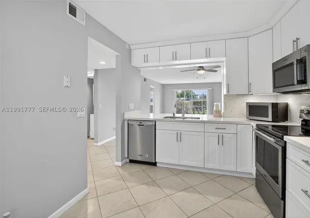 Photo 3 of Condo for sale at 901 Sw 128th Ter #102A, Pembroke Pines, FL 33027 | MLS# A11991777 | Listing updated on 2026-10-08