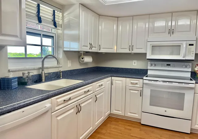 3rd image of 145 Atlantis Blvd, Atlantis, FL 33462