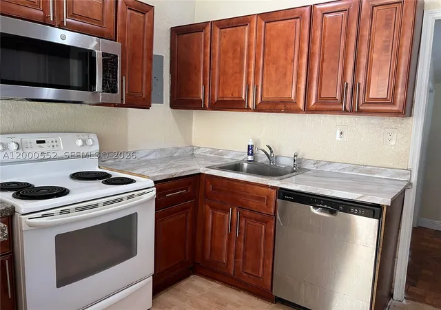 1st image of 931 Nw 34th Way, Lauderhill, FL 33311 | MLS# A12000552