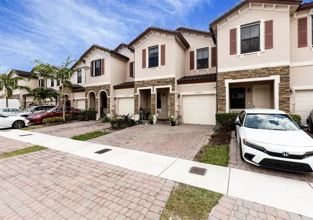 Photo 1 of Townhouse for sale at 15070 Sw 119Th Ln, Miami, FL 33196 | MLS# A11998974 | Listing updated on 2026-10-01